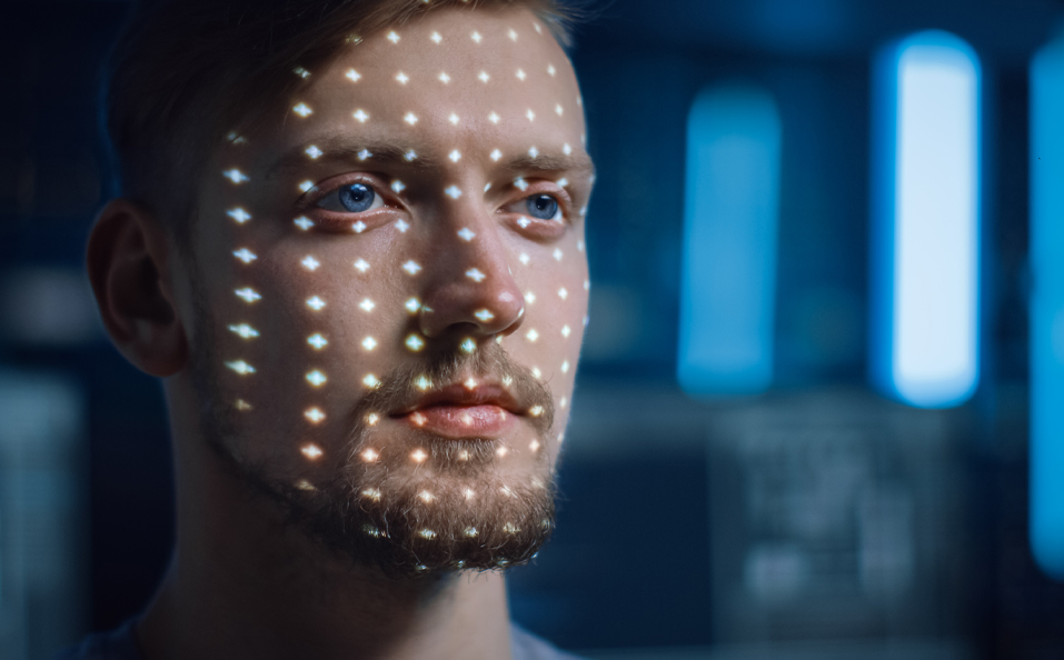 Man with Facial Recognition Lights on Face