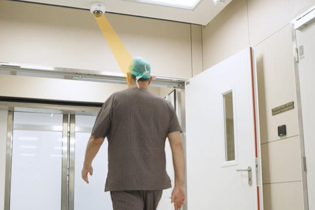 surgeon walking through access control system